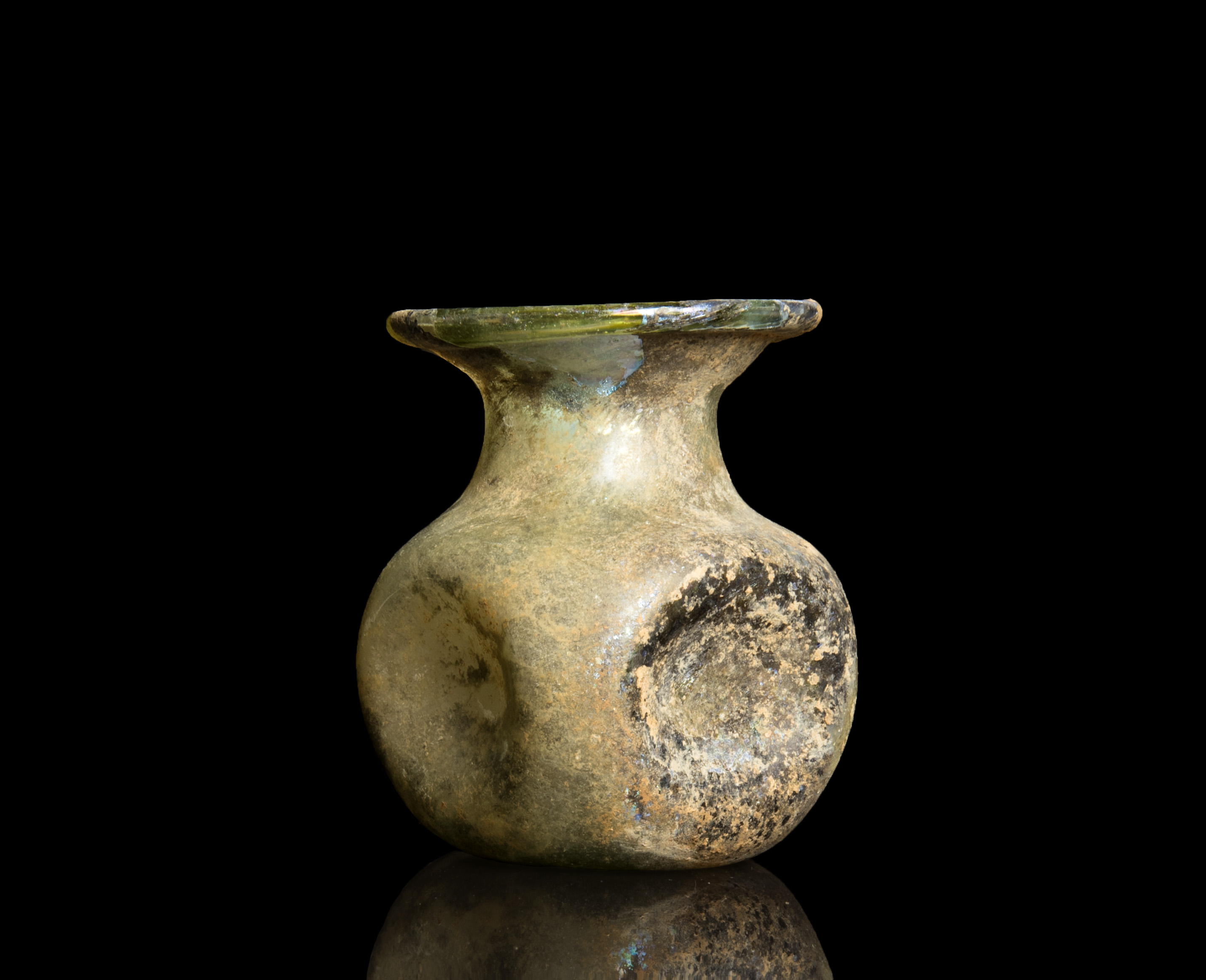 Roman glass jar with indented sides